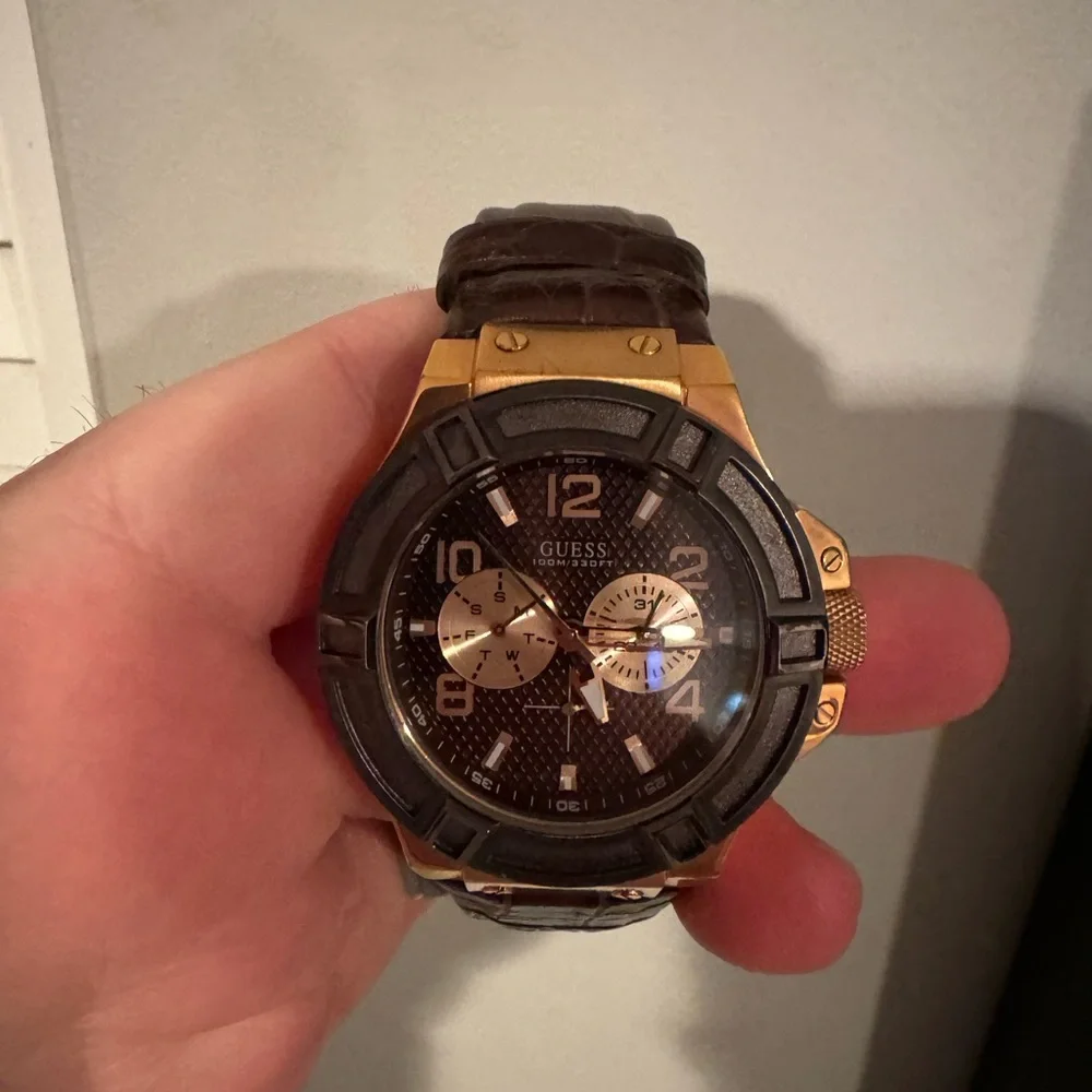 Guess men’s gold brown leather watch